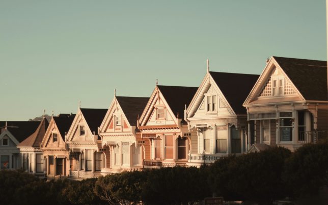 Sunlit Victorian houses known as the Painted Ladies in San Francisco, California.